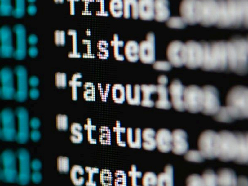 Close-up of programming code for software development and data integration